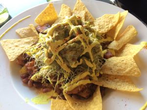breakfast scramble: beans, sweet potatoes, sprouts, guacamole and cashew cream. Simple but incredibly delicious! at Whyld Ass in Flagstaff