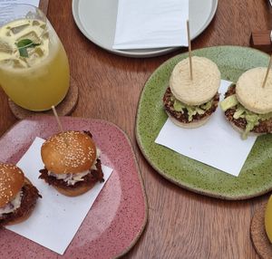 Katso sando - shitake, tare de tamaras e cole verde ; Brioche bbq - jaca verde, cole saw de maçā e bbq caseiro at Tau Cozinha in Sao Paulo