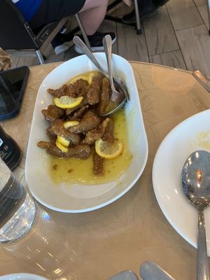 Lemon “tofu”. Which you can clearly see is not actual tofu.  We forgot to take a photo until after we served some  at Lemongrass Cafe in Edmonton