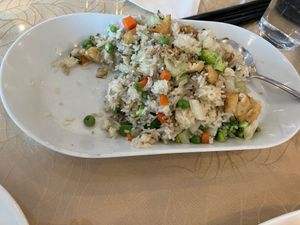 Veggie fried rice.  We forgot to take a photo until after we served some at Lemongrass Cafe in Edmonton