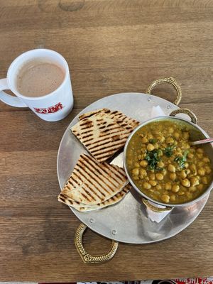 Channa masala, naan, vegan hot chocolate at Remedy Cafe - Jasper Ave in Edmonton