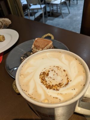 Rooibos Chai with Soy and Tiramisu Chzcake😻 at Remedy Cafe - Jasper Ave in Edmonton