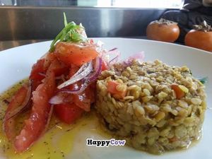 Baby orange lentil curry cake with tomato salad at Wild Scallion in Penticton