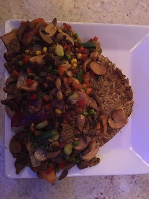 Tacu Tacu con especial vegano
(Peruvian style mixed beans and rice with mixed vegetables, soy meat and mushrooms) at Aji Limon in Cape Coral