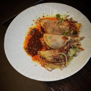 Kohlrabi wrapped with plant mince dumplings and dressed with home made chili soy sauce at Shu in Collingwood