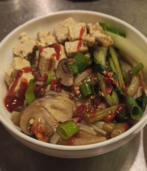 Gluten-free ramen with rice noodles, bok choy, mushrooms and tofu at Veganarchy in Antwerpen