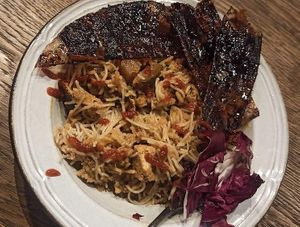 Yummy nasi goreng with smoky rice paper 'bacon' and a side of fresh red cabbage at Veganarchy in Antwerpen