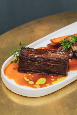 Port Beef Bourguignon: Braised beef, port wine, heirloom carrots, pearl onions, crimini mushrooms, yukon potatoes at Le Basque in New York City