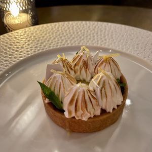 Tarte au Citron 
Brown butter tartlet, lemon curd, black cherry preserve, vanilla and elderflower meringue   at Le Basque in New York City