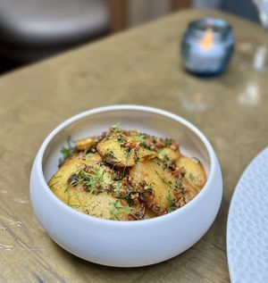 Smashed Yukon potatoes   at Le Basque in New York City
