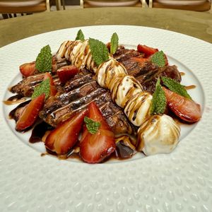 Grilled Pressed Croissants with Strawberries and Balsamic Glaze    at Le Basque in New York City