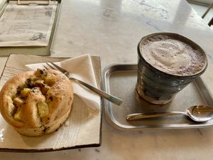 Potato/ham brioche (very good) and hojicha latte (nice, with a typical flavour)  at Atelier Giri in Arnhem