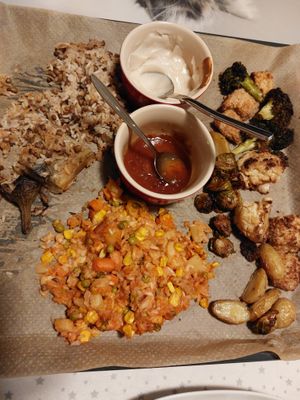 Tofu in panco crust, rice with vegetables, roasted eggplant  at KOOKPLANT in Drongen