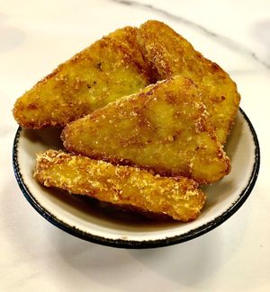 Hash browns  at Oui Sports Bar + Terrace in Dubai