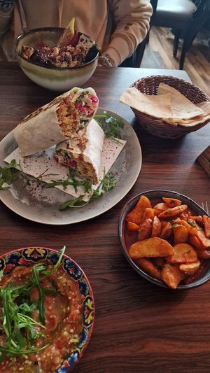Batata Harra, Falafel Wrap at Arabisk Restaurant in Innsbruck
