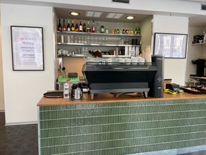 Specialty coffee, plant based milk alternatives and vegan version of sweet Czech pastry called Kolache. at Kolacherie Na Rybníčku in Prague