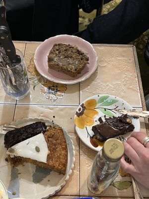 Everyone else’s desserts: carrot cake, brownie, and banana coffee cake?!? (Don’t remember the standalone)  at Vegan Food Tour in Paris