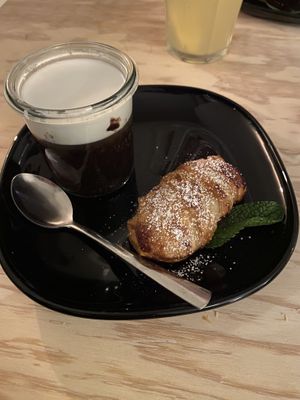 Dinner night dessert (vegan) - Sticky black rice with salted coconut milk and fried banana  at Devy Indonesian Street Food in Hamburg