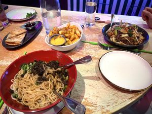 GF Dan Dan noodles, scallion pancakes, cumin fries, glass noodles    at Spicy Moon - Chelsea in New York City