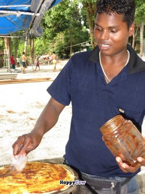 Crispy crepes and traditional roti are made with palm oil margarine, not butter. at Bombay Restaurant in Koh Lipe