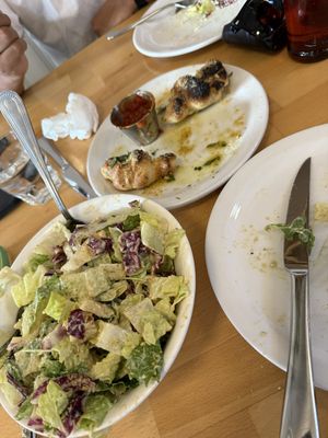 Garlic knots and cesear salad. Garlic knots were especially good.  at Via Tevere Main Street in Vancouver