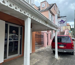 Outside.   Easy to find on Queens Cross   at Mister Tea in St Croix