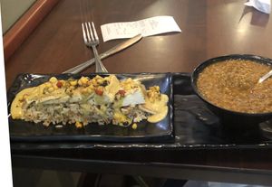 Coconut tofu on rice with lentil soup - delish!  at Fresh To Order in Atlanta