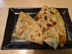 Scallion pancake -1 piece at Isshin Ramen & More  in Auburn