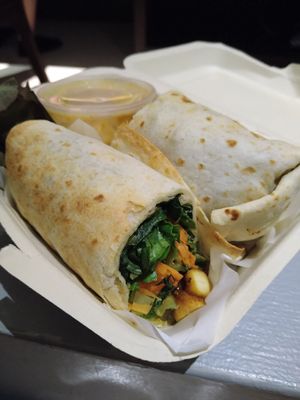 Chickpea wrap, peanut butter sauce in small jar. at The Planters in Ao Nang