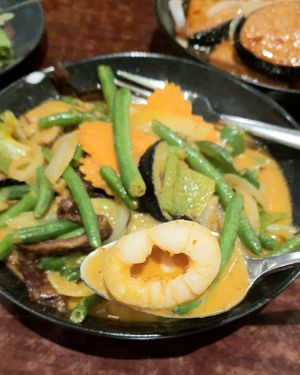 Red Curry with lychee - close-up of 1 of 2 lychees... at Au Lac Royal Vegan Cuisine in Dickson