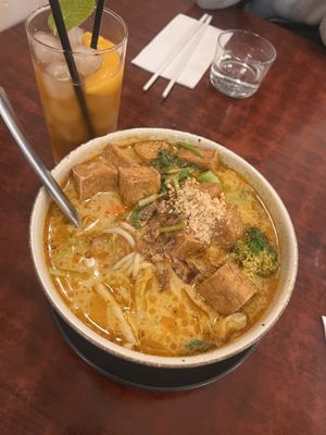 Laksa and peach iced teaa  at Au Lac Royal Vegan Cuisine in Dickson