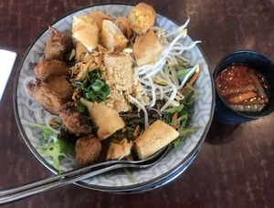 Vermicelli salad with spring rolls and BBQ soy meat at Au Lac Royal Vegan Cuisine in Dickson