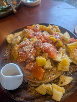 pancake paradise: diced papaya, banana, mango, apple, orange at Lovegan Cafe in Moalboal