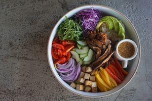 12가지의 신선한 야채와 식물성 불고기 , 두부, 현미밥에 수제 드레싱 소스로 풍미를 더한 비건 비빔밥입니다. 글루텐 프리  at Jeju Veggies - 제주베지스 in Jeju