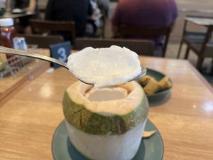 My favorite part is to scoop up every bit of the coconut meat and thank you to the universe with every bite! So, so  yummy from nature! 😋 🌴 🥥   at DMK - S & P - T1 in Bangkok
