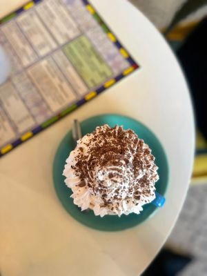 Hot chocolate with a huge swirl of vegan cream   at Coffee Woolston in Southampton