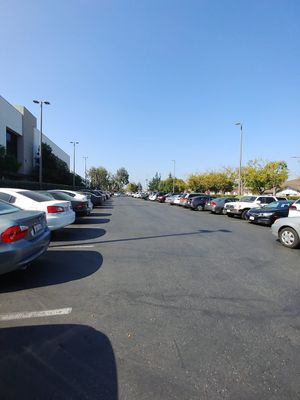 4. Parking lot extends the length of the mall at Loving Hut in Santa Clara