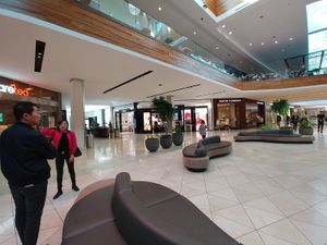 9. Walk until you see this communal area. The Dining Terrace is above you. at Loving Hut in Santa Clara