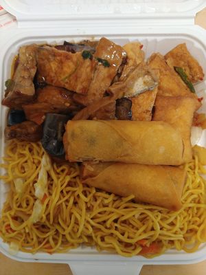 $12.14: Top Left: Eggplant Tofu, Lemongrass Tofu, Chow Mein,  two crispy rolls at Loving Hut in Santa Clara