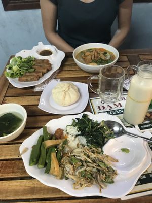 Selection from buffet, spring rolls, steamed bun, Pho and Soya milk at Quan Chay Dam in Hoi An