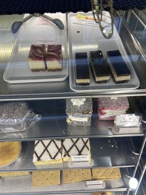 Lemon cheesecake slice + bounty slice  at Sunrise Bakery  in Truro