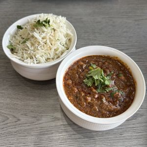 Kaju Curry (spicy) and Garlic Rice  at HONEST in Burlington