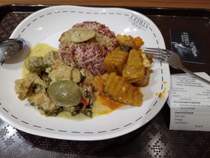 Green curry and another dish 75Baht at Sawasdee Vegetarian in Bangkok