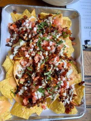 Al pastor nachos on Tuesday special (half off) at Juan More Taco  in Richmond