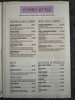 Menu with separate vegan curry section and vegan options marked throughout the rest of the menu.  at MONA'S in London