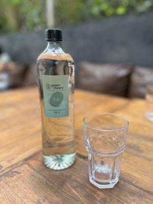  Boujee bottled water 😁 (I took the bottle home to reuse!)  at Green Theory in Bangalore