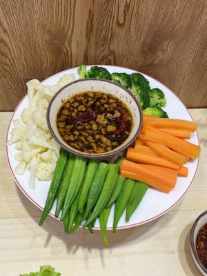 vegetables dipped in traditional Vietnamese dipping sauce  at Om Vegan - Ve Day An Chay in Da Nang