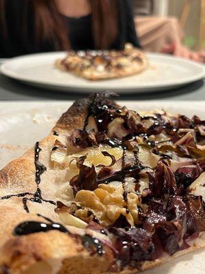 cacio e pepe vegan, noci, radicchio e glassa di aceto balsamico   at Languorino in Cesena