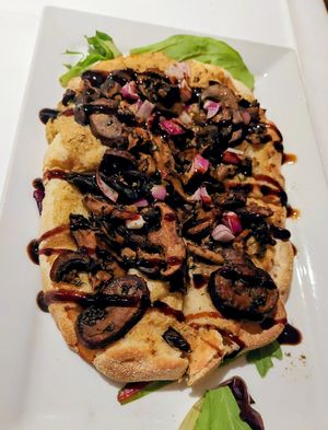 Mushroom flatbread with rosemary hummus & balsamic reduction at General Warren in Malvern
