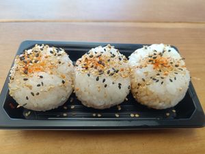 Onigiri Spicy Tofu Rice Balls 

Sushi Rice filled with Spicy Tofu (beancurd)
Topped with Spicy Sesame Seeds at More Than Sushi in Poole